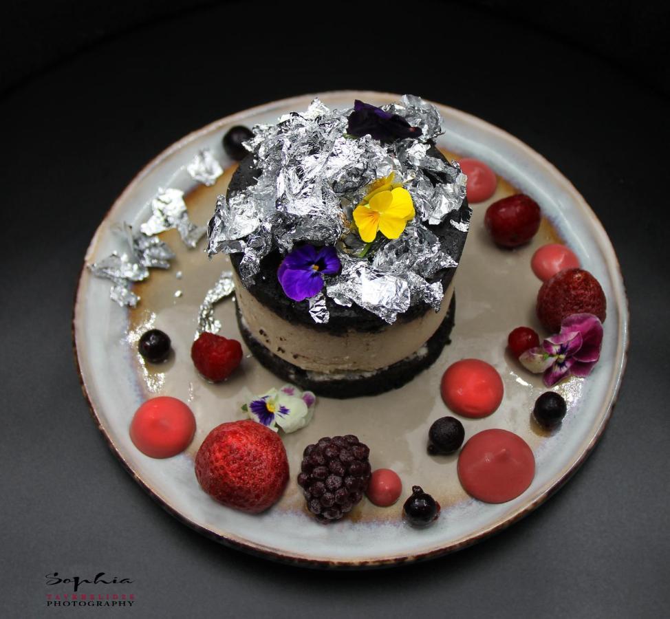 River Side Hotel Tbilisi Exterior photo A chocolate cake with edible silver leaf
