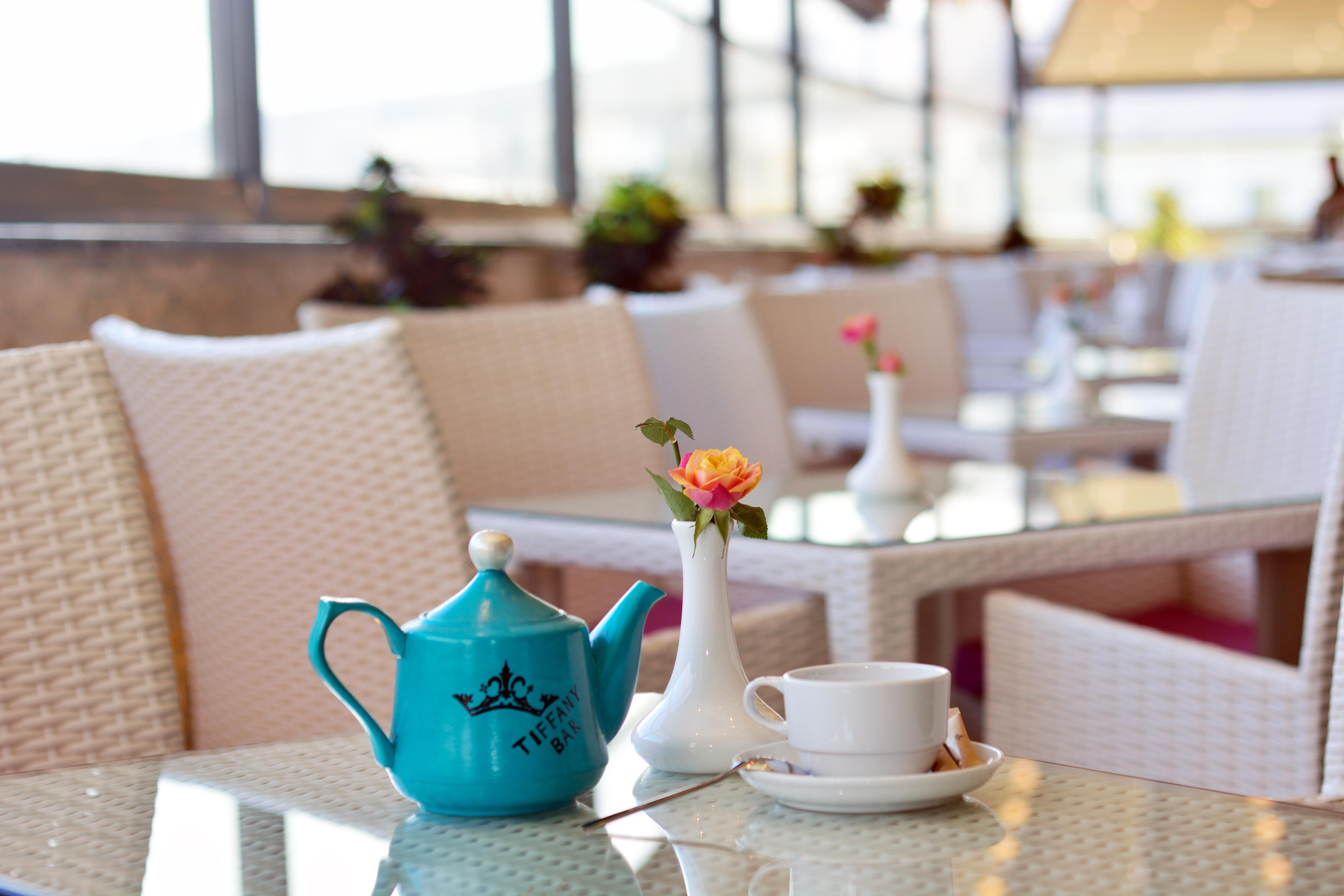 River Side Hotel Tbilisi Exterior photo Tea time at the hotel