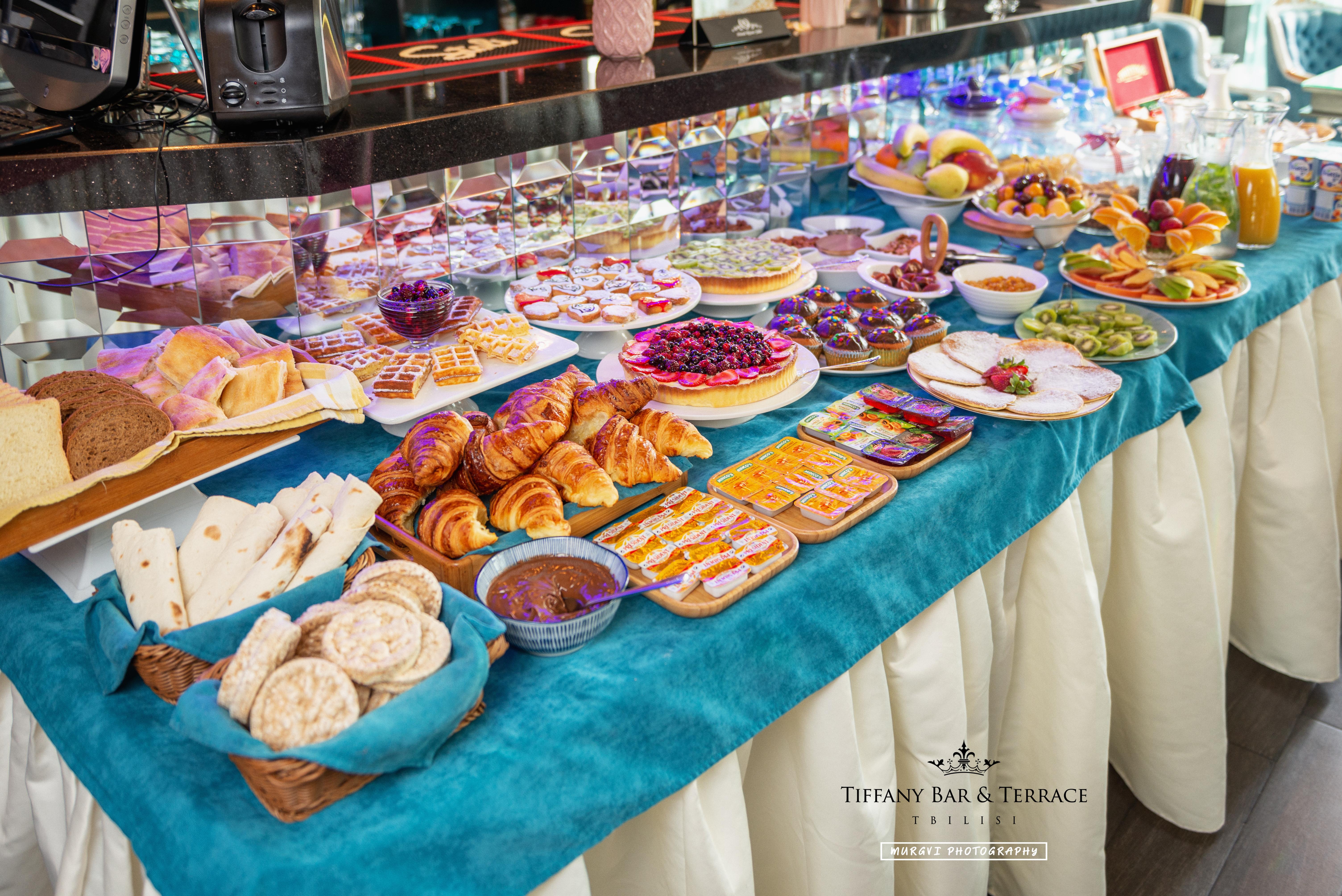 River Side Hotel Tbilisi Exterior photo A buffet at a hotel